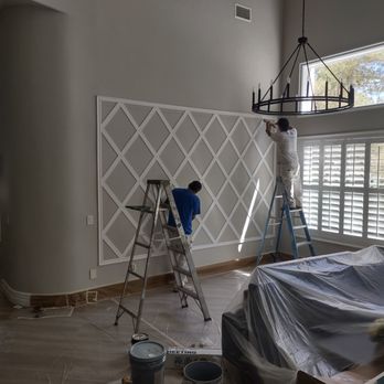 Detail Painting - Wall design being installed. - Painters Near Me - Las Vegas, Nevada Detail Painting - Wall design being installed. - Painters Near Me - Las Vegas, Nevada