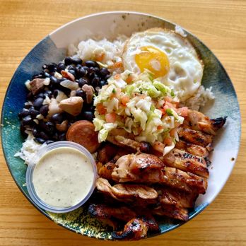 Ta Joia - Feijoada bowl with house chicken (feijoada stew over brazilian rice with a fried egg, pico & cilantro sauce) - Asian Fusion Near Me - Bothell, Washington Ta Joia - Feijoada bowl with house chicken (feijoada stew over brazilian rice with a fried egg, pico & cilantro sauce) - Asian Fusion Near Me - Bothell, Washington