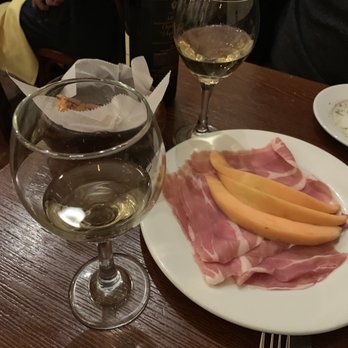 Riccardo Enoteca - Prosciutto with melon. MHMMMMM - Italian Near Me - Chicago, Illinois Riccardo Enoteca - Prosciutto with melon. MHMMMMM - Italian Near Me - Chicago, Illinois