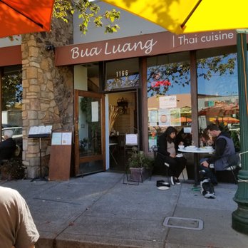Bua Luang - The front of the restaurant.  There's an outdoor parklet with picnic tables and benches out front. - Thai Near Me - Albany, California