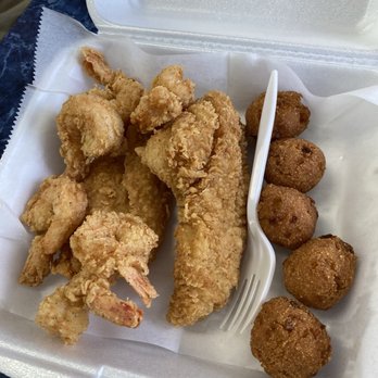 Fountain View Fish Market - 2 fish, 6 shrimp with hushpuppies (cole slaw not pictured) - Seafood Near Me - Houston, Texas