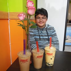 Bubble Tea Fresh Fruit Juice - Milk Teas on Ice are kiddo approved.  Freshly crafted Mango Bubble Tea (right)