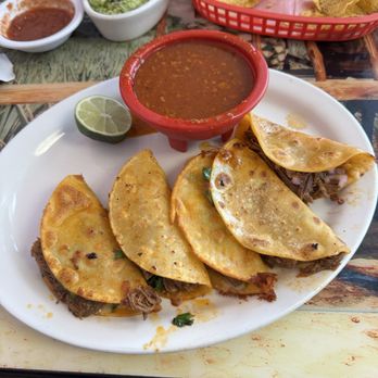 Monarca Mexican Food - The Quesa Birria! The waitress recommended I try this and I loved it! My new favorite! Tender fresh steak served with Birria Broth! - Mexican Near Me - Knoxville, Iowa
