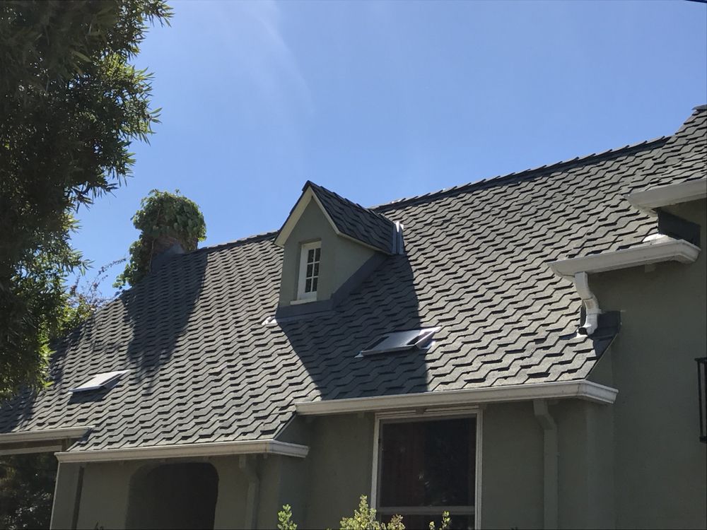 Slide of Acker Roofing