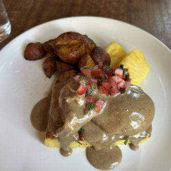 Tilikum Place Cafe - Eggs Benedict with black garlic hollandaise sauce - New American Near Me - Seattle, Washington Tilikum Place Cafe - Eggs Benedict with black garlic hollandaise sauce - New American Near Me - Seattle, Washington