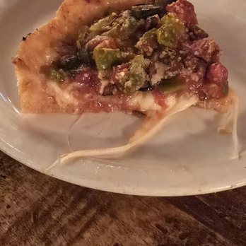 Lou Malnati's Pizzeria - Piece of black olives/bell peppers deep dish pizza - Pizza Near Me - Oak Park, Illinois Lou Malnati's Pizzeria - Piece of black olives/bell peppers deep dish pizza - Pizza Near Me - Oak Park, Illinois