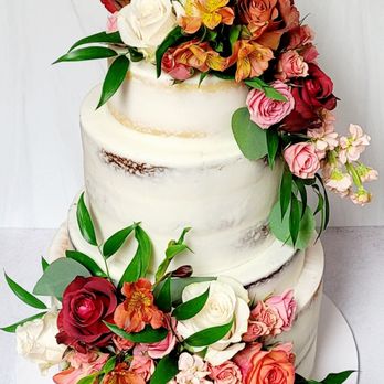 Patty Cake Confections - a wedding cake with flowers - Desserts Near Me Patty Cake Confections - a wedding cake with flowers - Desserts Near Me