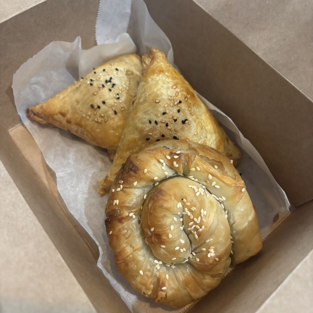 Firin Bakery & Pizzeria - Spinach barák ( front) beef stuffed pastry(back) - Bakeries Near Me - Garland, Texas