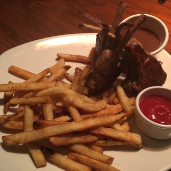 Outback Steakhouse - Amazing lamb with French fries! The lamb sauce is out of this world! - Steakhouses Near Me - Peabody, Massachusetts