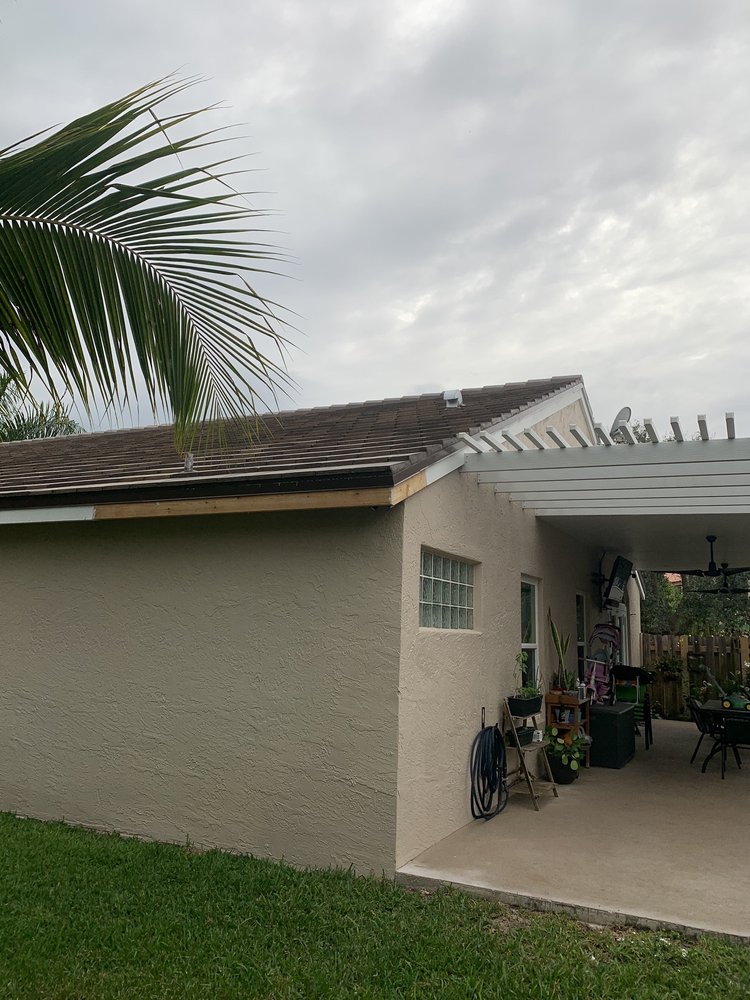 Slide of Earl W. Johnston Roofing