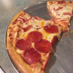 Pizza Village - Delicious custom pizza! Great, fresh salad bar and a relaxed atmosphere