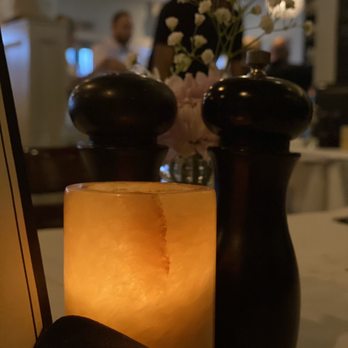 Stella's Southern Bistro - a candle and menu - New American Near Me - Simpsonville, South Carolina