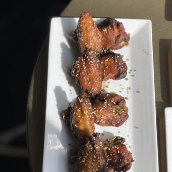 Bourbon N' Bubbles - Chicken Wings with sweet and spicy cilantro glaze - Bars Near Me - Charleston, South Carolina