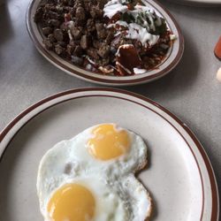 Hilltop Inn Family Dining - Chilaquiles mixed verdes & rojo sauce with eggs and stake