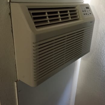 Motel 6 - Loosely screwed in panel around a heat unit. You can see into the neighbors room around the panel. - Hotels Near Me - Page, Arizona