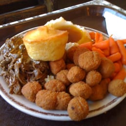 Beef, mashed potatoes & gravy, fried okra, and carrots