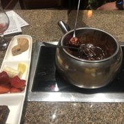 Photo of The Melting Pot - Grand Rapids, MI, United States. Chocolate fondu Dessert  Flaming Turtle