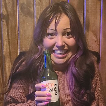 Miya Izakaya - My friend Tina with the beverage we shared. We were so stuffed! - Izakaya Near Me - Wichita, Kansas Miya Izakaya - My friend Tina with the beverage we shared. We were so stuffed! - Izakaya Near Me - Wichita, Kansas