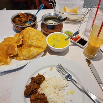India Garden - Poori, a dish containing goat (I don't remember), naan - Indian Near Me - Garland, Texas