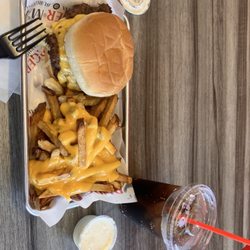 Burger Max - Jr cheeseburger meal with cheese added to fries along with a side of ranch.