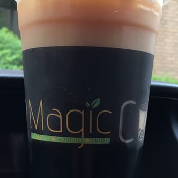 Magic Cup - Black Milk Tea with coconut milk and double boba. Strong tea with a mild sweetness. Great for a cloudy morning. - Coffee & Tea Near Me - Richardson, Texas Magic Cup - Black Milk Tea with coconut milk and double boba. Strong tea with a mild sweetness. Great for a cloudy morning. - Coffee & Tea Near Me - Richardson, Texas