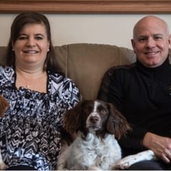 Enviro Masters Lawn Care - Owners Larry and Tricia with their three Brittanys