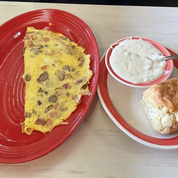 Breakfastime - Meat Lovers Omelette with Sausage gravy and biscuit - New American Near Me - Salisbury, North Carolina Breakfastime - Meat Lovers Omelette with Sausage gravy and biscuit - New American Near Me - Salisbury, North Carolina