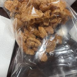 J&L Smokehouse Fish & BBQ - Homemade pork rinds with a strawberry rub.
