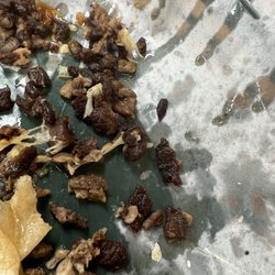 Steak burrito with crunchy burnt steak pieces and extra grease.