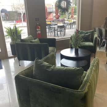 Lucky Goat Coffee - Seating area decorated for the holidays - Coffee & Tea Near Me - Flowery Branch, Georgia Lucky Goat Coffee - Seating area decorated for the holidays - Coffee & Tea Near Me - Flowery Branch, Georgia