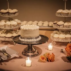 Siblings Bakery - Bride & groom cake and guest cupcakes featuring carrot cake, red velvet, and banana butter cream flavors