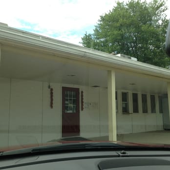China Wok - the front of a white house with a red door - Chinese Near Me - Bluffton, Ohio China Wok - the front of a white house with a red door - Chinese Near Me - Bluffton, Ohio
