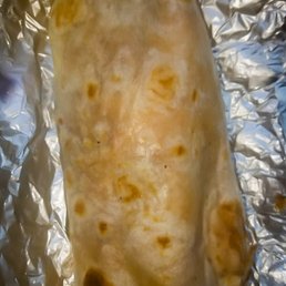 Looks like a normal burrito but it's heavy!  One of the heavier burritos I've ever tried.