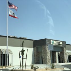 Tulare County Department Of Child Support Services - The building is at the very back of the drive behind all the warehouses