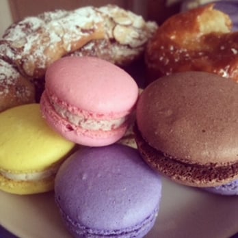 Rosellini's - Almond croissant, kougin, aman, and macarons (lemon, raspberry, lavender chocolate, and chocolate) - Bakeries Near Me - Seattle, Washington Rosellini's - Almond croissant, kougin, aman, and macarons (lemon, raspberry, lavender chocolate, and chocolate) - Bakeries Near Me - Seattle, Washington