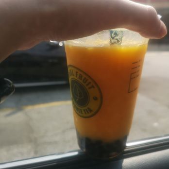 Real Fruit Bubble Tea - a person's hand holding a cup - Bubble Tea Near Me - Mississauga, Ontario