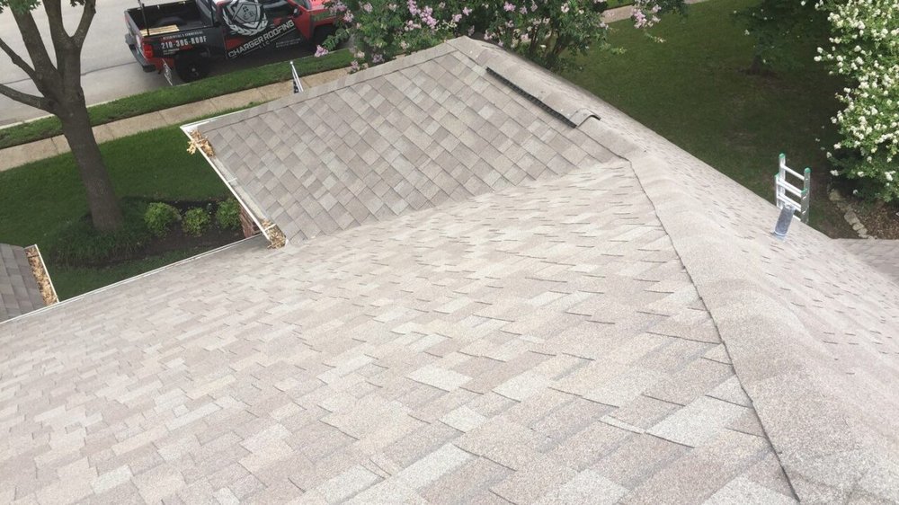 Slide of NSL Roofing Solutions