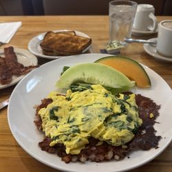 Dapper's West Family Restaurant - Corned beef hash extra crispy, scrambled eggs with spinach, fruit and side of bacon extra crispy sourdough toast and coffee