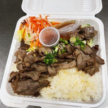 Pho Viet’s II - 32. Grilled Lemongrass Sliced Beef with Rice - Vietnamese Near Me - Newton, Massachusetts Pho Viet’s II - 32. Grilled Lemongrass Sliced Beef with Rice - Vietnamese Near Me - Newton, Massachusetts