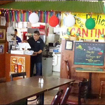 Cafe Delicias - Friendly Eduardo, who seemed to be the only staff member working the restaurant, rings up an order at the cash register. - Mexican Near Me - Auburn, California Cafe Delicias - Friendly Eduardo, who seemed to be the only staff member working the restaurant, rings up an order at the cash register. - Mexican Near Me - Auburn, California