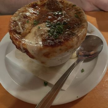 Andy's Adirondack Grille - My boyfriend got this French onion soup to start. He said it was delicious! - American Near Me - Malta Ridge, New York