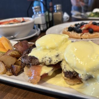 The Joy Bus Diner - Eggs Benedict with Chula salmon/Capitol Farms burger patty add ons - Breakfast & Brunch Near Me - Phoenix, Arizona