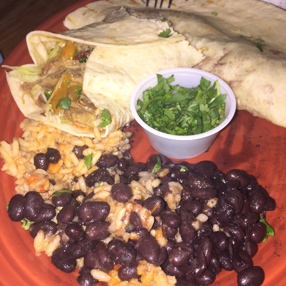 Continental Divide - Beef tacos with rice and beans and a side of cilantro. - Mexican Near Me - Charlottesville, Virginia Continental Divide - Beef tacos with rice and beans and a side of cilantro. - Mexican Near Me - Charlottesville, Virginia