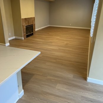 Serene Flooring - empty living room and fireplace - Flooring Near Me - Kyle, Texas Serene Flooring - empty living room and fireplace - Flooring Near Me - Kyle, Texas