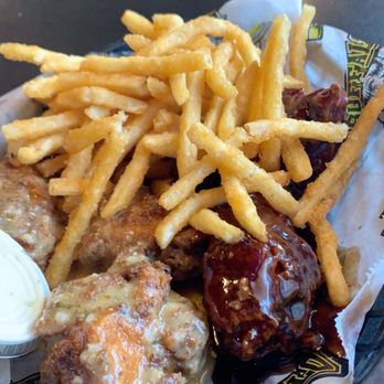 Buffalo61 Bar & Grille - Bone In Wings, (Parm. Garlic and Teriyaki) with French Fries. - Bars Near Me - Fort Madison, Iowa Buffalo61 Bar & Grille - Bone In Wings, (Parm. Garlic and Teriyaki) with French Fries. - Bars Near Me - Fort Madison, Iowa