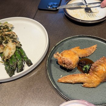 28 Nomad - Left: Asparagus; Right: Stuffed Chicken Wing - Asian Fusion Near Me - New York, New York 28 Nomad - Left: Asparagus; Right: Stuffed Chicken Wing - Asian Fusion Near Me - New York, New York