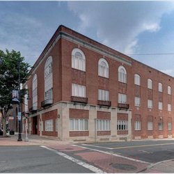 Manchester Dentistry - Watkins Center Builiding. Our office is street level at the rear of this inside the building
