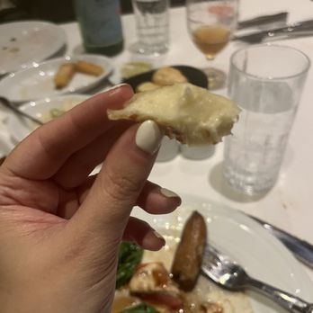 Fogo de Chão - A bite of cheese. - Brazilian Near Me - Boston, Massachusetts Fogo de Chão - A bite of cheese. - Brazilian Near Me - Boston, Massachusetts