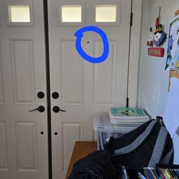 Height of peephole on inactive door