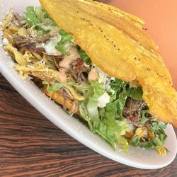Los Chamos - This has chicken, pork and beef. Portion is big